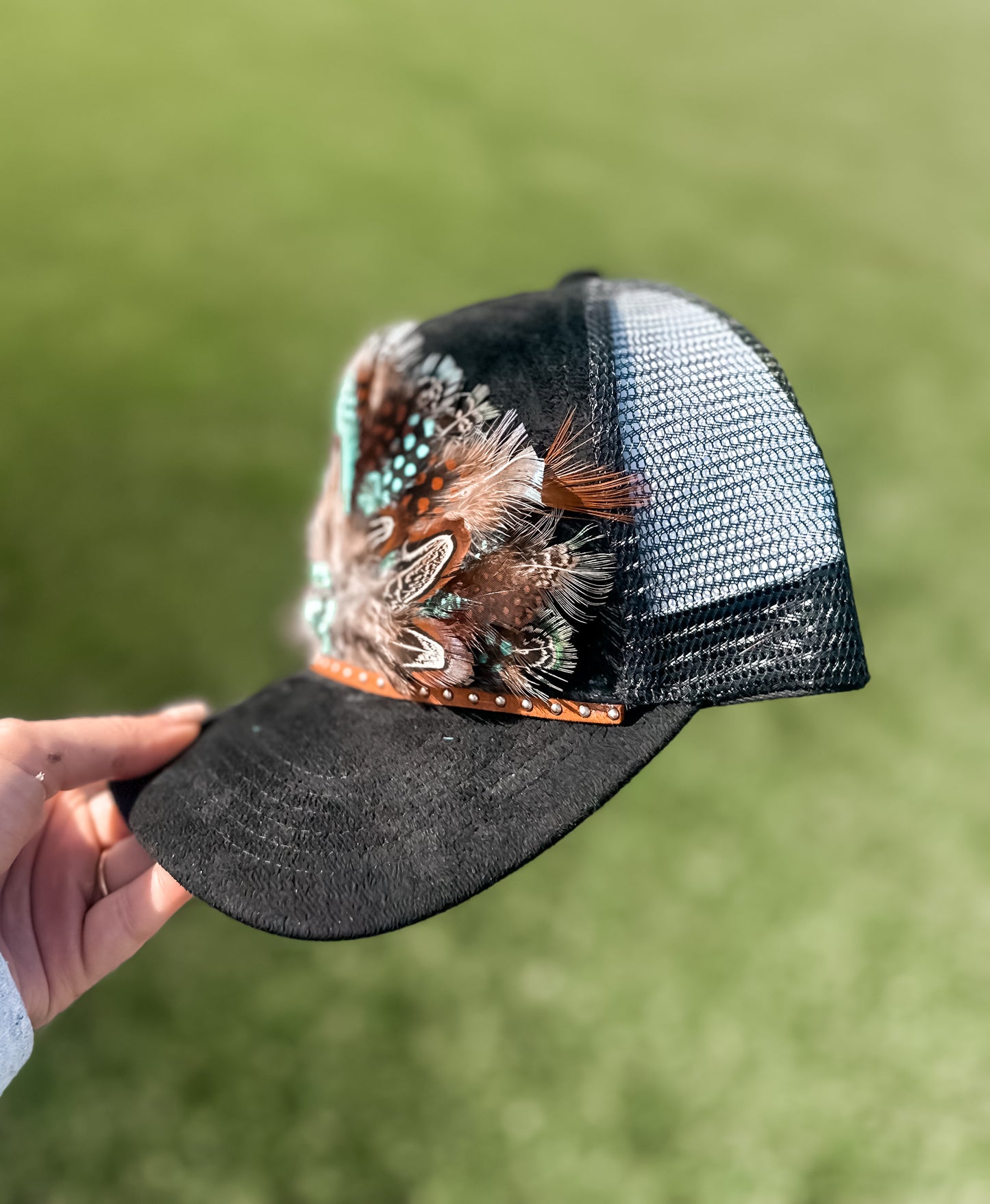 Black Feather Trucker Hat with Turquoise and Silver Clover Charm & Brown Studded Leather